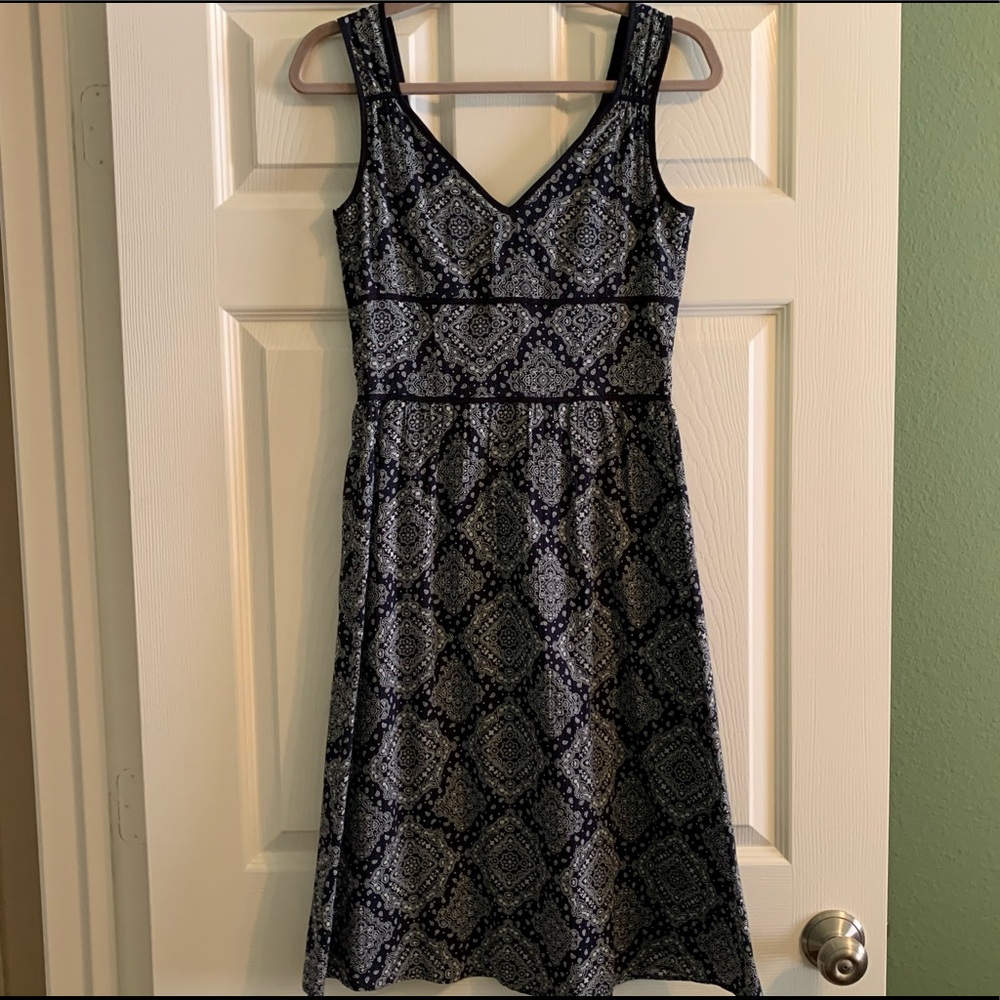 Navy blue fit-and-flare dress.